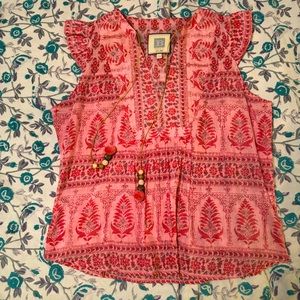 Bell ruffle sleeve blouse with artisanal tassel details.z block printed. XS.